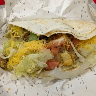 Grilled Chicken Stuffed Quesadilla Taco. Not bad, but could definitely use a sauce inside!