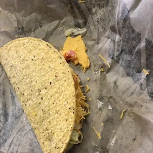 Taco with a chunk of cheese in it. How do you not see this?