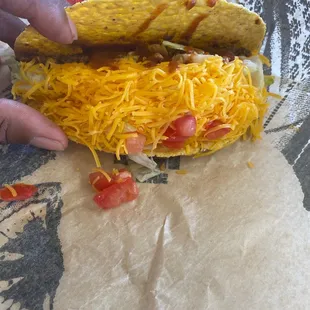 Taco with extra cheese I paid for