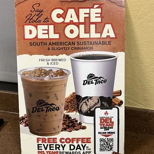 a box of coffee and a cup of coffee