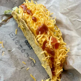 The Del Taco is loaded with cheese.