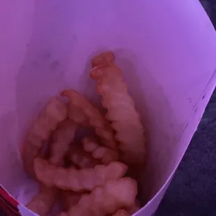 onion rings in a paper container