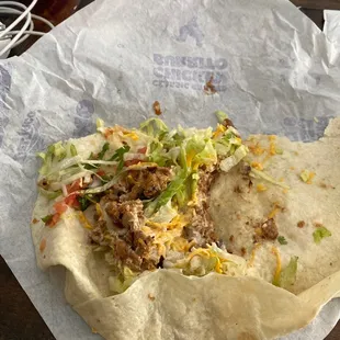 This is supposed to be a classic chicken burrito. Tortilla is dried out. Chicken is dry and legitimately tastes like dog food.