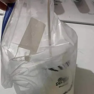 The shake cup that has the Kay-5 powder in it.