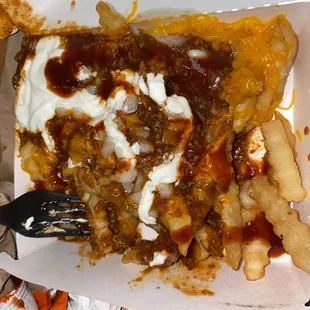 Charged me for extra cheese &amp; I asked for light chili -_-