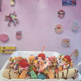 Pistachio, Ferrero, and cheesecake Ice creams, coconut, granola, Fruity Pebbles, sour gummy worms, chocolate sauce, whipped cream, sprinkles
