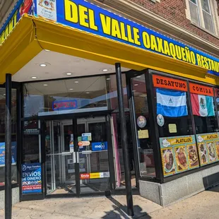 The restaurant front with the new signage.