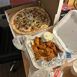 Deluxe pizza and hot wings.