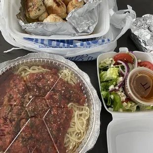 Top: garlic knots  Bottom: spaghetti with meat sauce and side salad