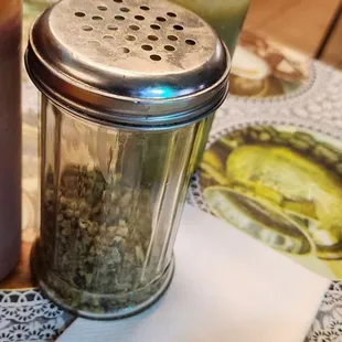 a table with soup and condiments