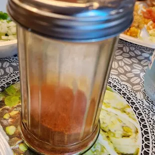 a jar of sauce on a table