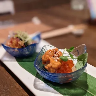 two bowls of food on a plate