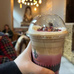 Rose Delah Latte with oat milk and light ice, regular sweetness