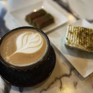 Caramel macchiato, pistachio milk cake and pistachio baklava.