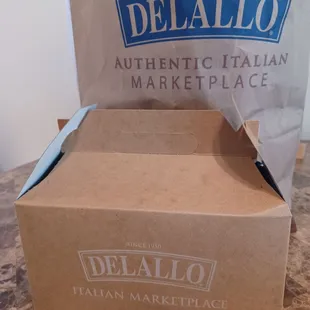 The fish sandwich is so big it has to be packed in a box.