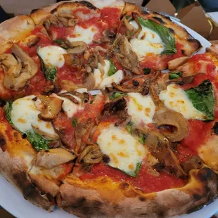 Margherita pizza, $18 – 3.5 Stars, Add Brown Buttered Fancy Mushrooms, $9 – 3 Stars