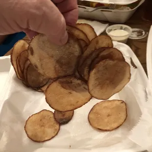 One of three big clumps of potato slices.