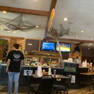 a man standing at the bar
