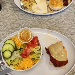Front:  PastaSalvi Special And Salad Combo.  Back:  Pork Tenderloin &amp; Sausage Gravy, Hash Browns, Fried Eggs, And Fresh Baked Biscuit.