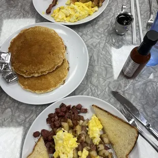 Corned beef hash, pancakes, big diner breakfast
