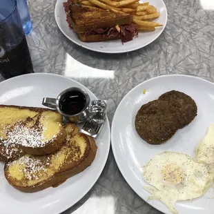 Delaney's breakkie (French toast, over easy eggs, sausage) and Reuben and French fries