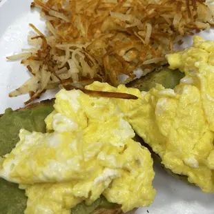 Avocado toast with eggs and hasbrowns