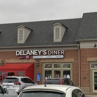 Outside sign for restaurant on Main St.