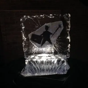 Ice sculpture from Chef Pete Catering. Chocolate &amp; Art Festival logo.