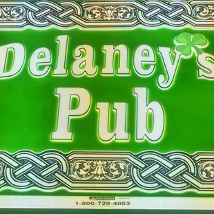 a sign for delaney&apos;s pub