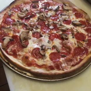 a pepperoni and mushroom pizza