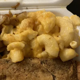 macaroni and cheese in a styrofoam container
