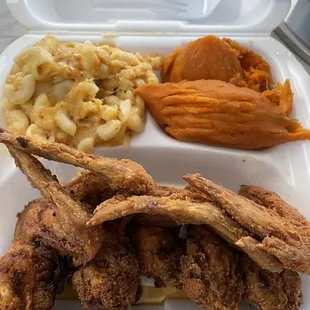 Chicken wing platter with Mac and cheese and yams. My boyfriend had the macaroni and salmon salad- SO good also. Highly recommend.