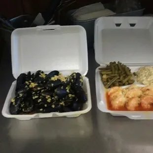 Small mussels in garlic and wine sauce. 1dozen spicy shrimp/in wine,garlic butter sauce,with stingbeans and potato salad