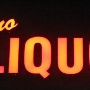 neon sign for delano liquor