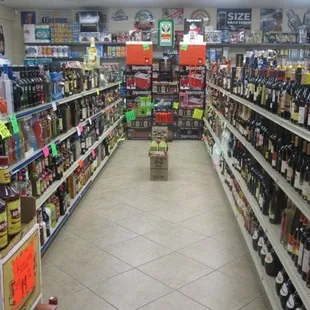 a wide aisle of liquor
