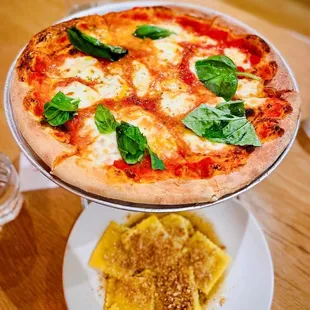 [1] Burrata bruschetta  my favorite dish in this restaurant  [2] Margherita pizza  [3] Butternut squash ravioli