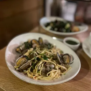 a plate of pasta with clams