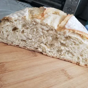 a loaf of bread on a cutting board
