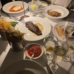 NY strip steak, Gnocchi, Cavatelli-oxtail ragu, zucchini fries, french fries