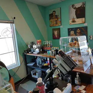 a counter with a variety of baked goods