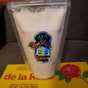 a cup of milk with a sticker on it