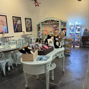 a table with a bunch of stuffed animals on it