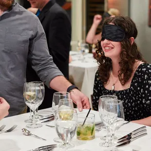 A young couple enjoying the blindfold course.