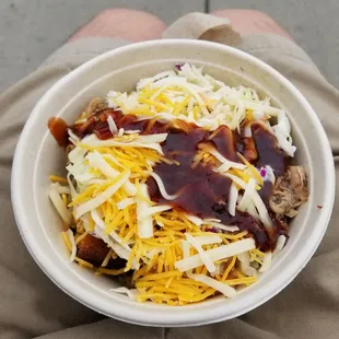 BBQ pulled pork + cheese + cherry Cole slaw + corn bread bowl