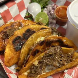 Queso-Birria tacos to-go. (Includes Consomé, salsa, onion and cilantro)