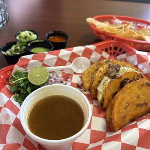 Birria tacos with consomé