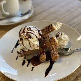 a plate of waffles and ice cream