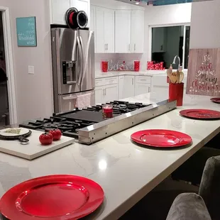 a kitchen with a stove and counter