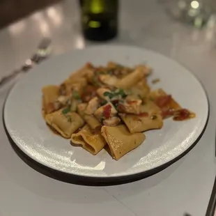 a plate of pasta on a table