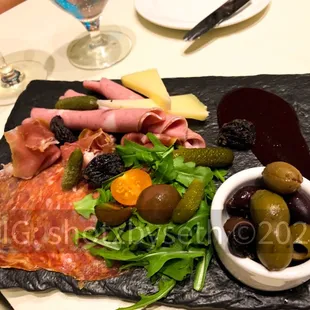Provocative thought: Where does the Meat and Cheese tray end, and the charcuterie board begin???